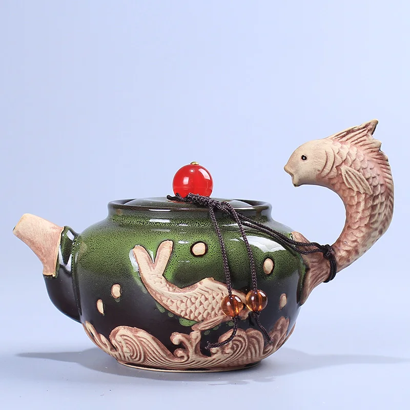 

Creative fish handle teapot Kiln Change Ceramic kungfu tea set