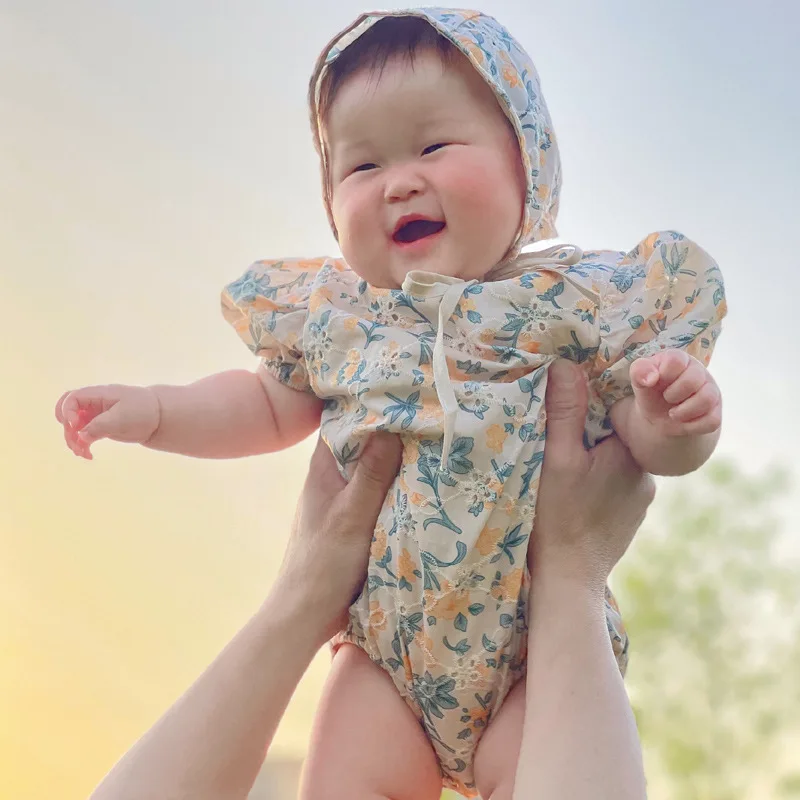 

2021 Summer New Baby Girl Puff Sleeve Bodysuit Fashion Cute Floral Print Newborn Clothes Toddler Jumpsuit With Hat Princess Suit