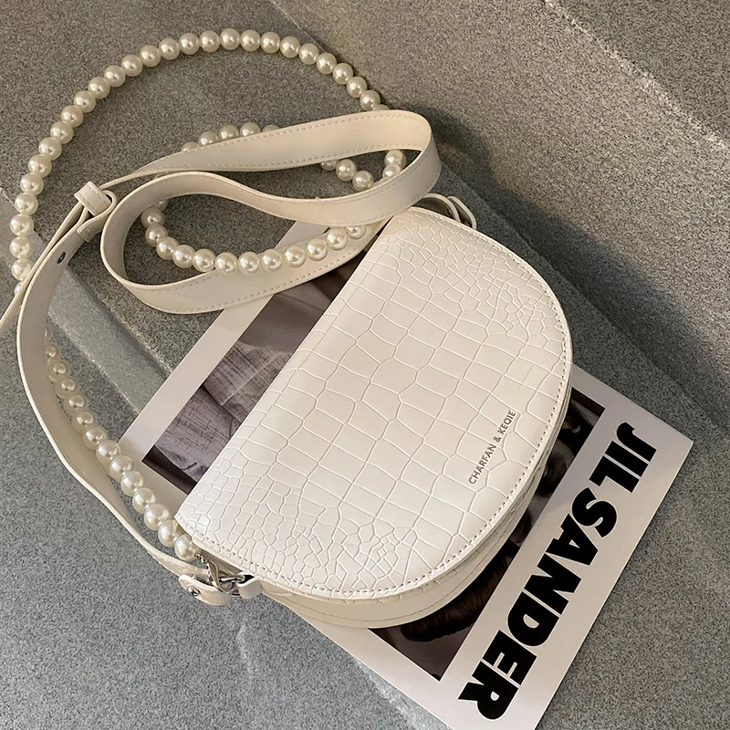 

2021 new fashion Pearl chain bag with high sense of foreign flavor small bag female Joker saddle bag