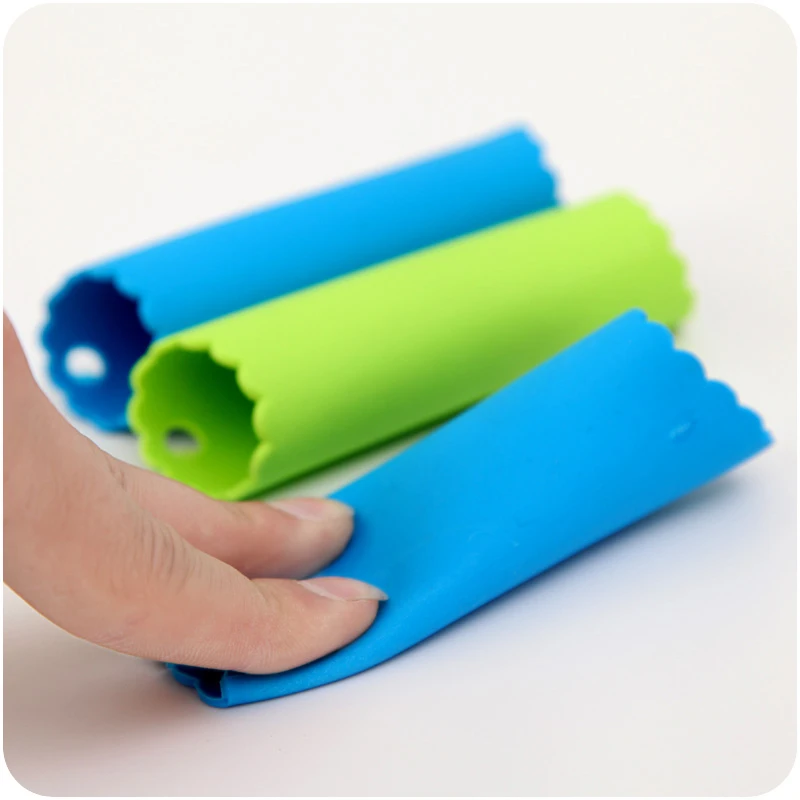 

Creative household goods practical kitchen daily necessities home daily necessities garlic peeler food grade silicone material