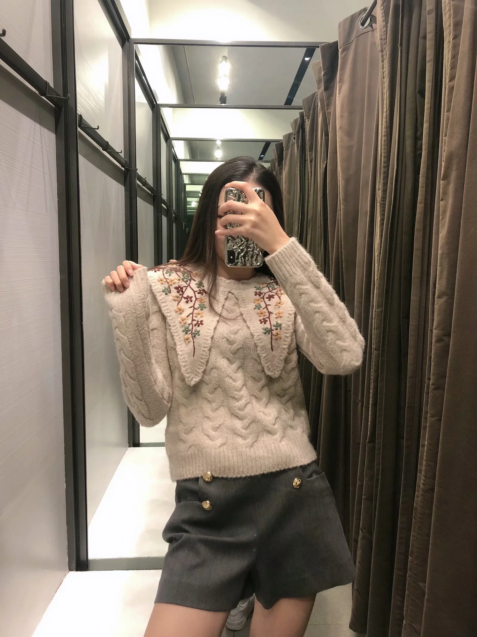 

Pullover with embroidered knit sweater