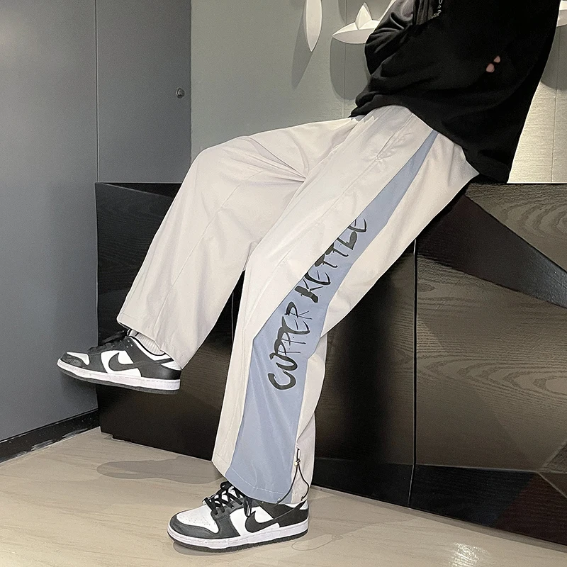 

Techwear 2021 Fashion Men Casual Pants Stitching Fashion Street Dance Loose Drawstring Wide-leg Joggers Cargo Pants Sweatpants