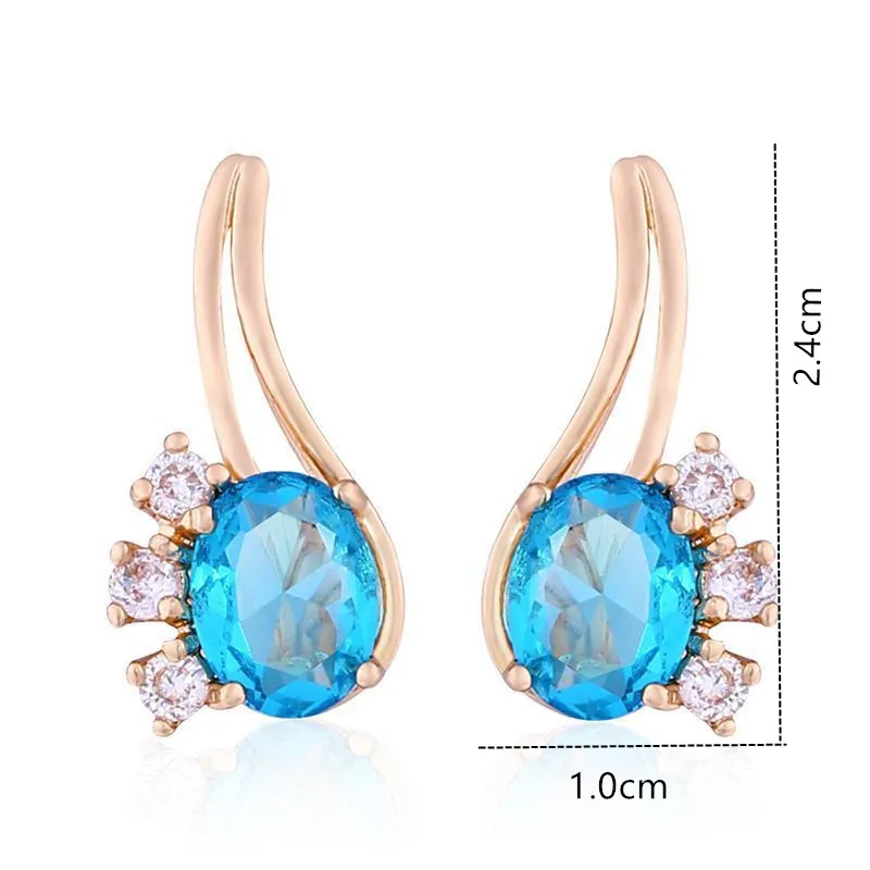 Серьги-гвоздики 585 розовое золото голубые циркониевые праздничные подарки