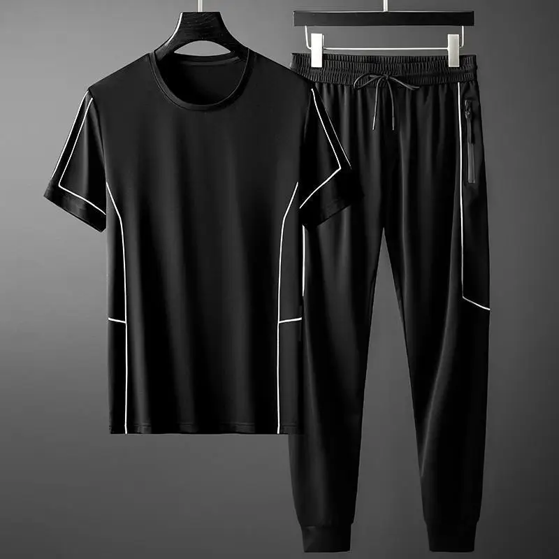 

Light luxury sports Outfits men's 2021 summer Korean trend stitching casual short sleeve T-shirt pants men's two-piece suit