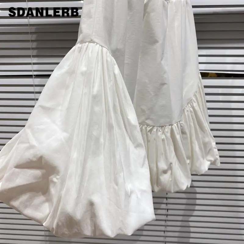 

2021 Spring Summer New Short Skirt Fashionable Hem Pleated Design Solid Color Flower Bud Skirt Women's Fashion Mini Skirt Jupe