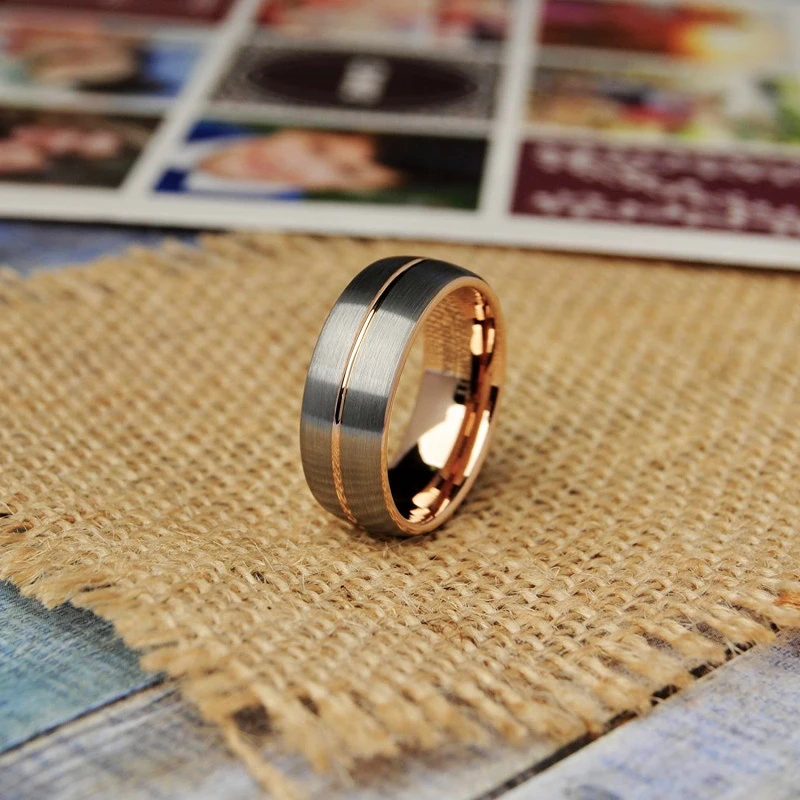 

Popular 8 mm WC steel noble rose gold and silver glossy ring. The charm of men. Fashion trend engagement accessories.