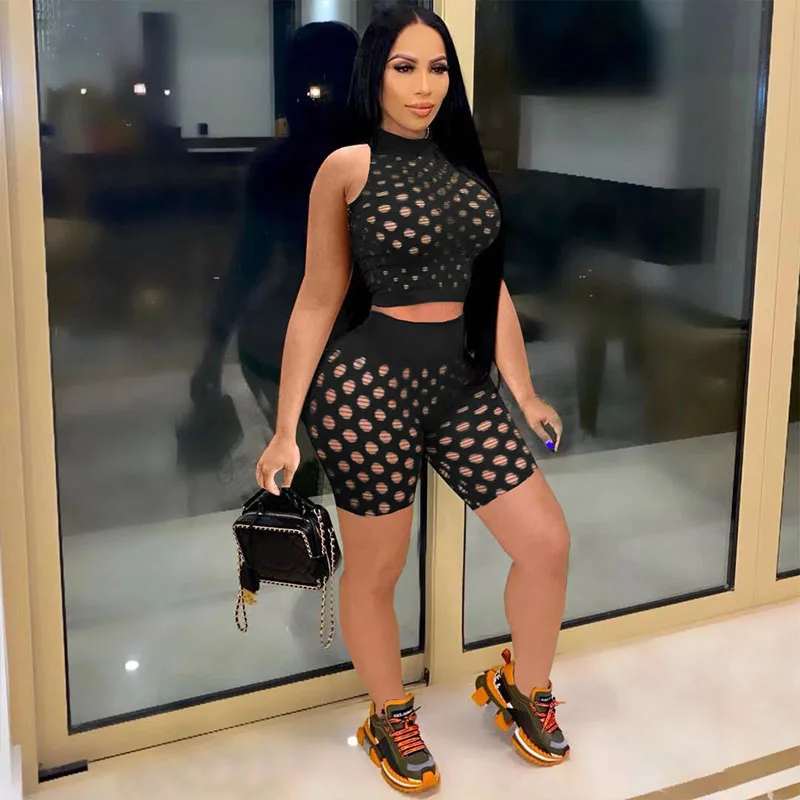 

Костюм спортивный женский из двух предметов, без рукавов, с вырезами