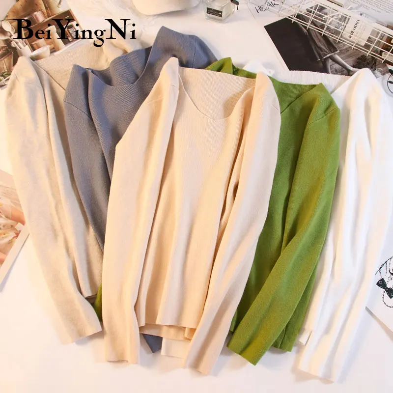 

Свитер женский трикотажный с V-образным вырезом и длинным рукавом