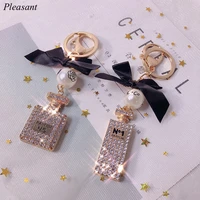 new creative crystal perfume bottle key chain fashion pearl bow bag key chain car pendant lady jewelry gift