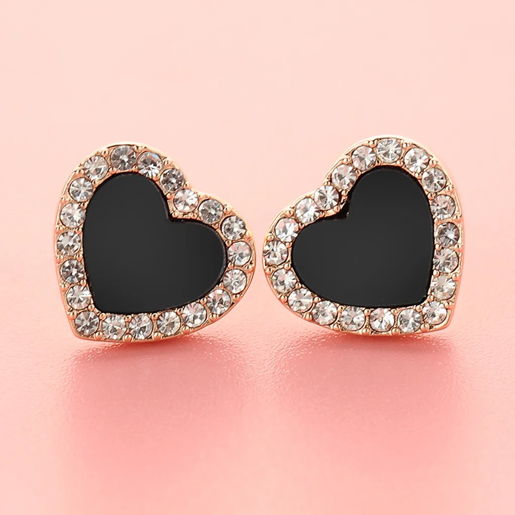 Женские крупные серьги гвоздики в форме сердца украшенные крупными