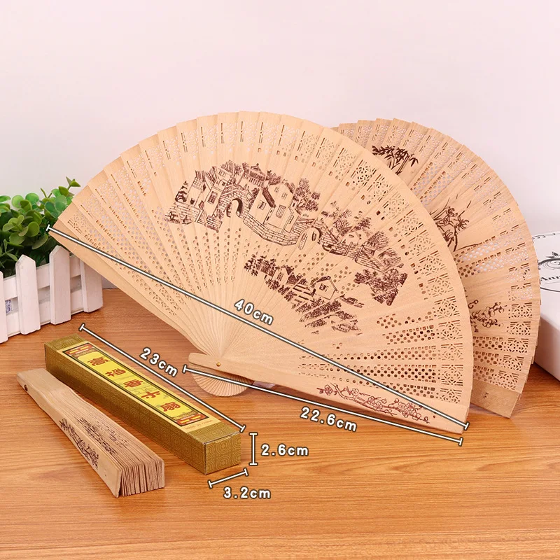 

Chinese Folding Fan Incense Wood Hand-cranked Fan Sandalwood Hollow Hand-held Fan Wood Carving Printing Decorative Craft Fan