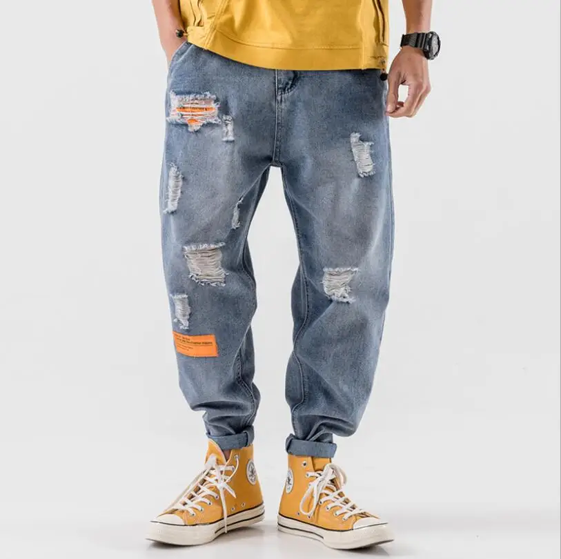 

Plus size 7XL hip hop fashions jeans men streetwear korean style denim trousers 2020 ripped patch jeans loose Harem Pants w870