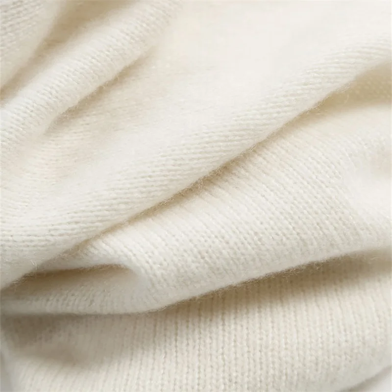 

The 2021 new V-neck loose women's sweater solid color warm and thick cashmere wool long-sleeved sexy knitted fluffy sweater