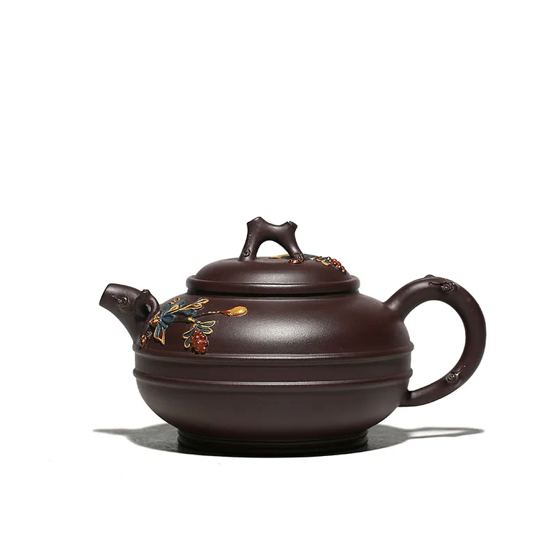 

Yixing purple clay teapot is handmade by Chang Yuehong, a famous teapot maker