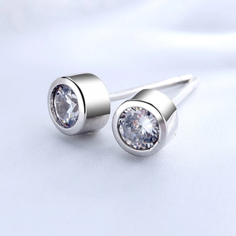 Модные серьги гвоздики с белым овальным цирконом простые элегантные со шнеком
