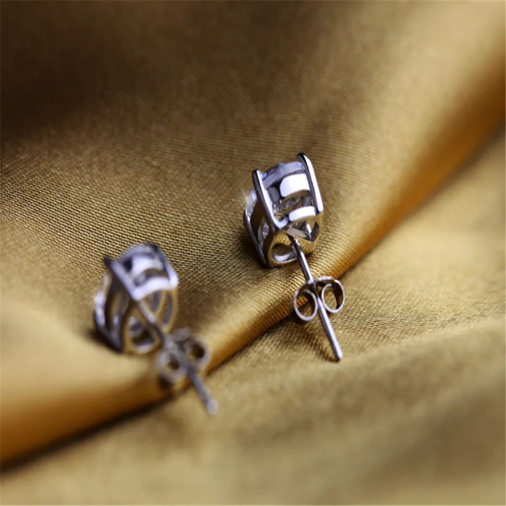 

New Silver Stud Earrings Temperament Female Models Wild Four-claw Zircon Ear Jewelry