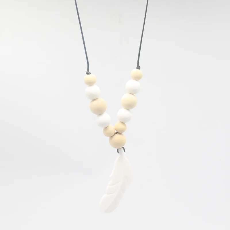 

New Fashion Feather Pendant Necklace Chewing Toy Beads Pacifier Clip Baby Teething Toy Silicone Training Baby Teethers Necklace