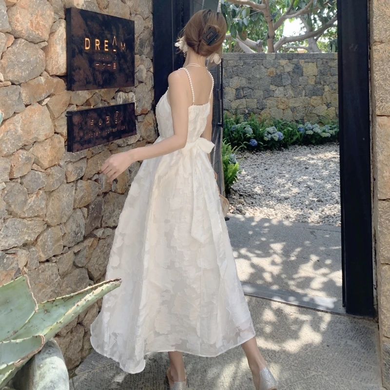 

COIGARSAM Beach Style Cute Women dress Spaghetti Strap Pearl Dresses White 1032