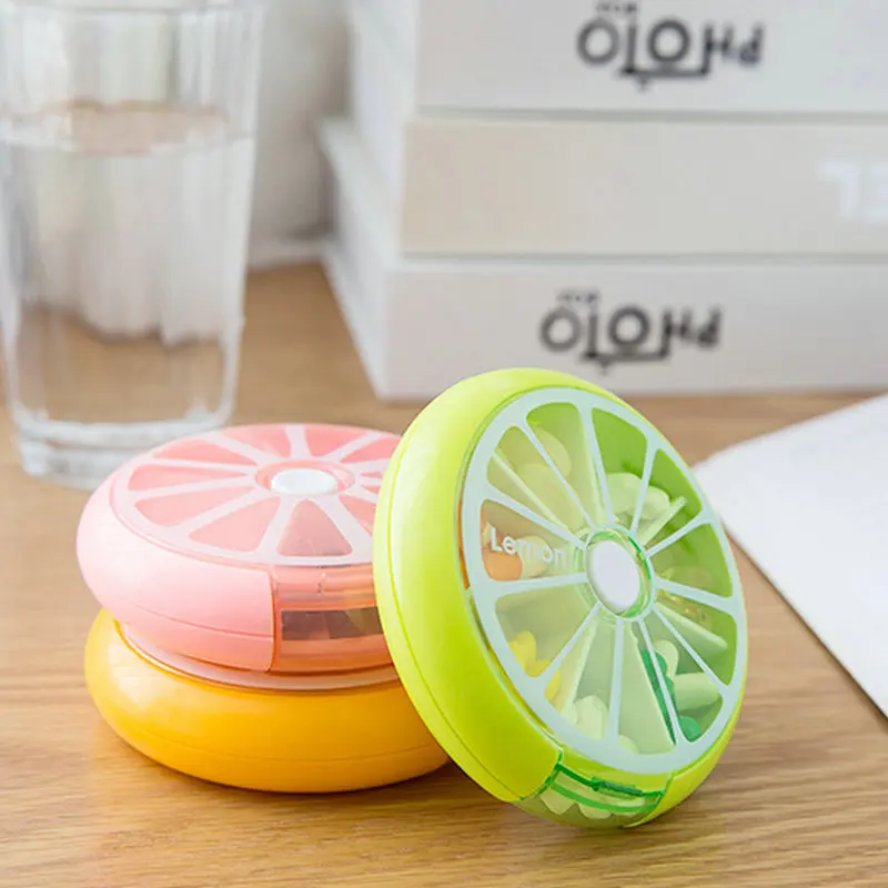 Коробка для таблеток портативный лимон семь-сетка вращающийся мини таблетки