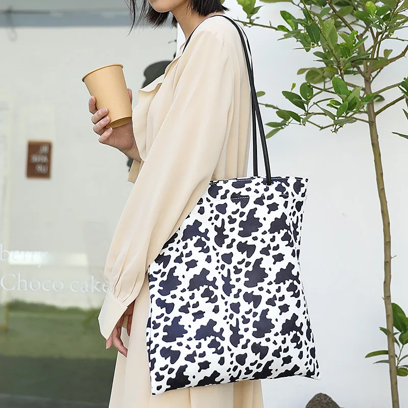 

Winter Fashion Cow Pattern Velvet Tote Bag Female Teenager Animal Printing Reusable Soft Fabric Stylish Shopping Shopper Bag
