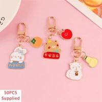 50pcs creative fruit animal rabbit cat keychain alloy pendant car bag chains charms couple gift jewelry accessories supplied
