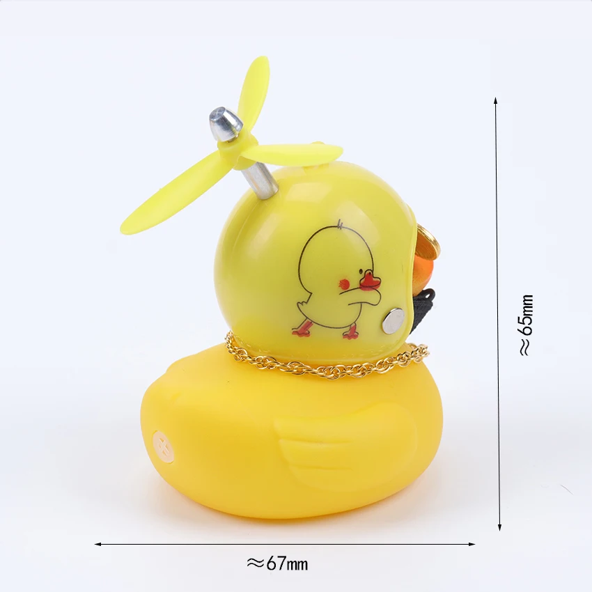 

2021 New Cute Little Yellow Duck With Helmet Propeller Rubber Windbreaker Duck Squeeze Sound Internal Car Decoration Kid Toy