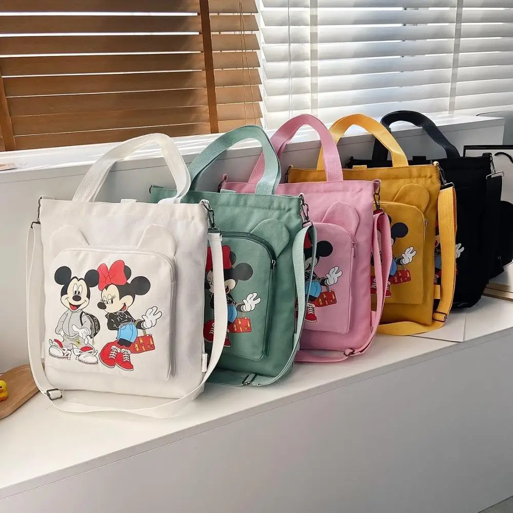 

Disney cute Mickey print ladies all-match large-capacity one-shoulder messenger canvas bag student casual schoolbag tutoring bag