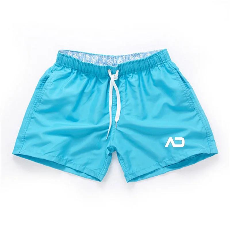 Мужские пляжные шорты с заниженной талией зеленые однотонные дышащие плавки