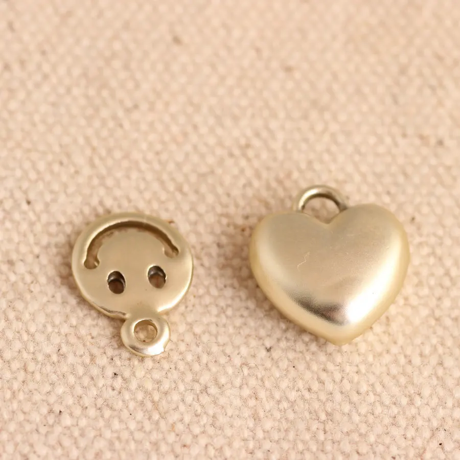 Подвеска из металлического сплава в форме сердца золотистого и серебристого