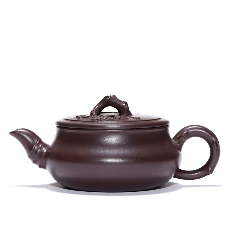 

Yixing ores are recommended by hand the teapot tea ores old plum flower purple clay evergreen pot capacity is 210 mm