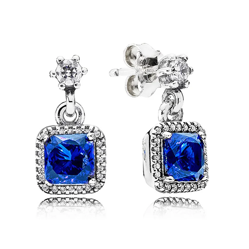 Женские серьги гвоздики серебряного цвета с кристаллами и