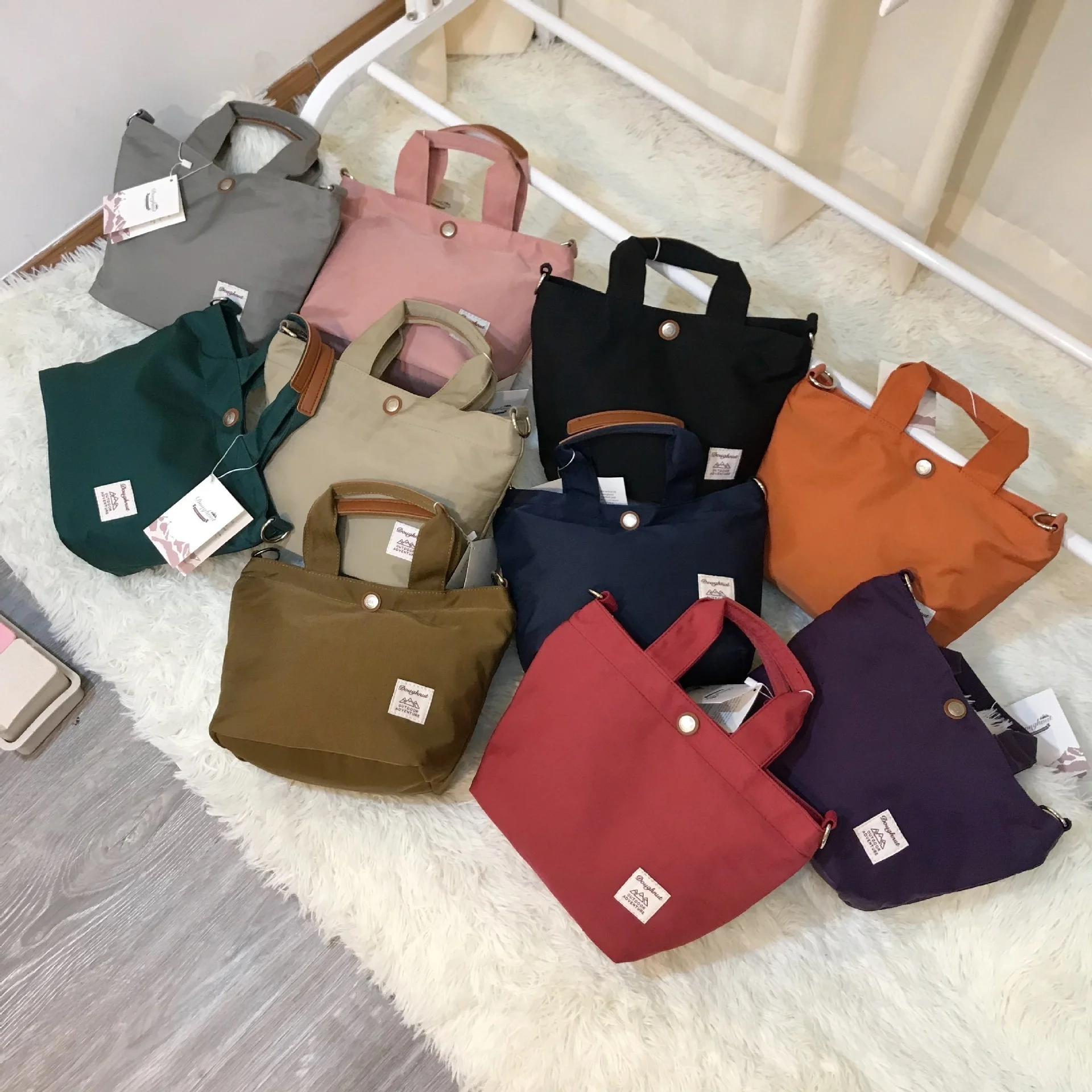 

Straight Hong Kong d'oughnut doughnut Japanese and Korean multi color one shoulder slant cross hand nylon bag small