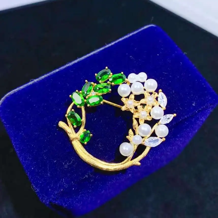 

Женский кулон из серебра пробы, с натуральными зелеными диоптриями