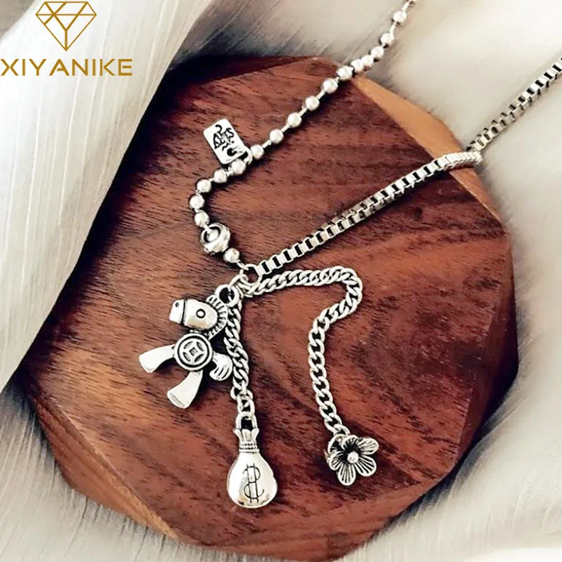 

XIYANIKE Silver Color Korean Horse Pendant Necklace Female Retro Tassel Pendant Flower Money Bag Necklace Clavicle Chain