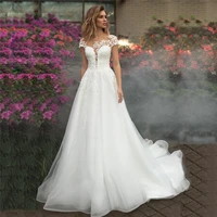sheer short sleeves tulle a line wedding dress buttons long custom online bridal gowns natural waistline robe de mariage 2021