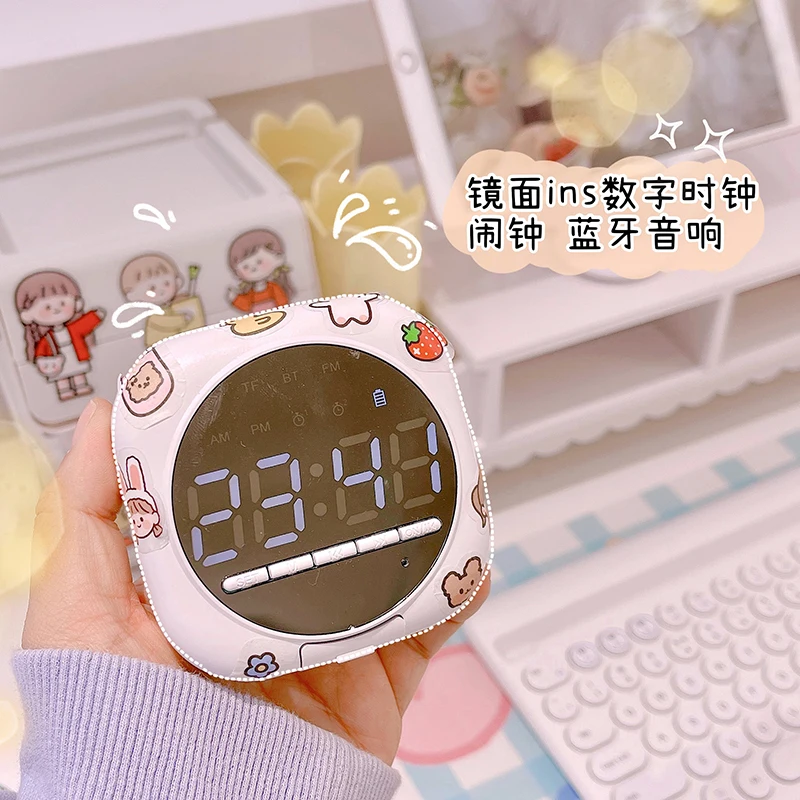 

Cute LED Mirror Digital Alarm Clock Subwoofer Wireless Bluetooth Speaker Bluetooth With Phone Holder Function