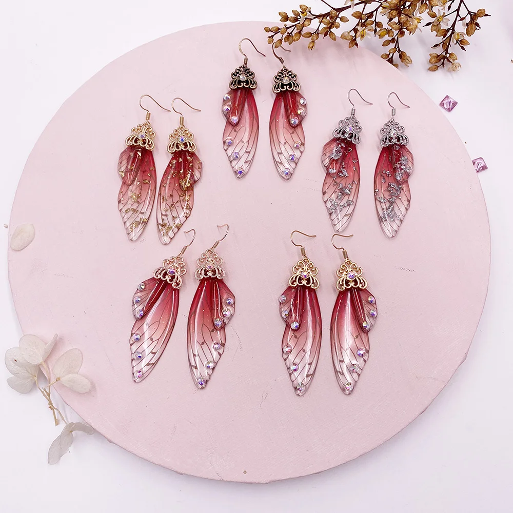 Женские серьги подвески с крыльями бабочки золотистого цвета эффектные