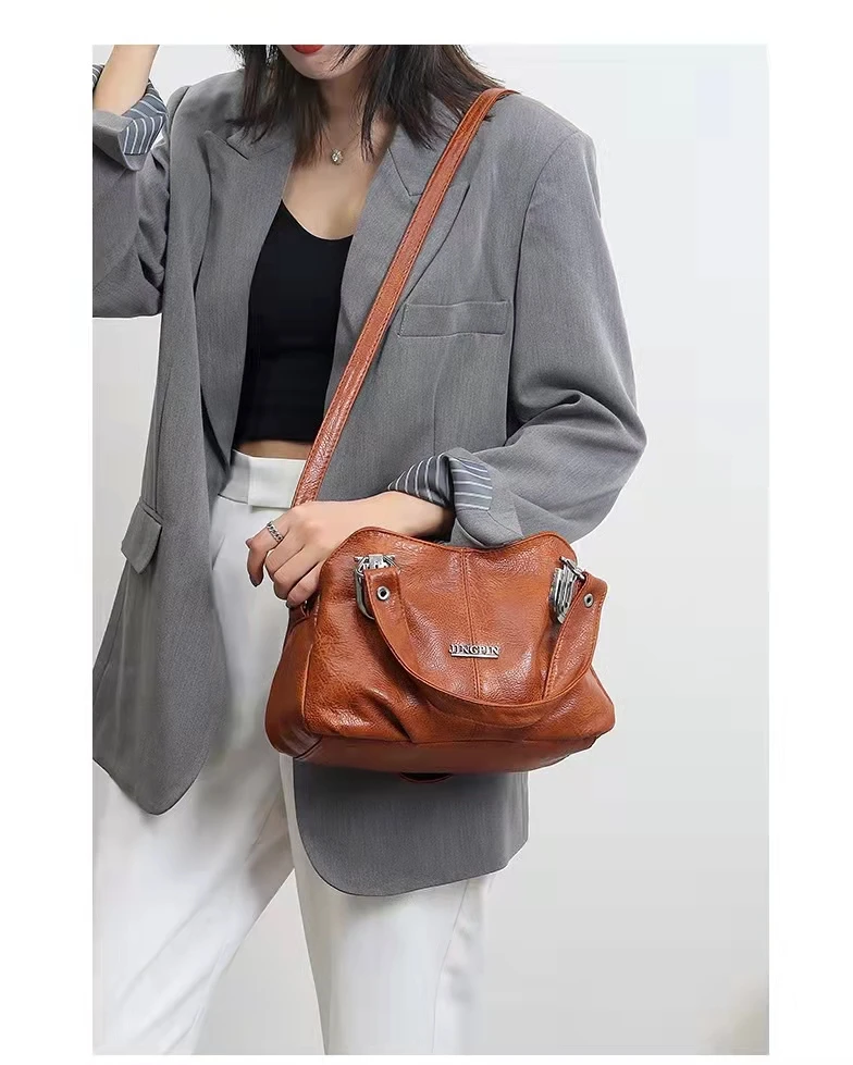 

New pu soft leather simple retro fashion large capacity light travel portable Boston bag