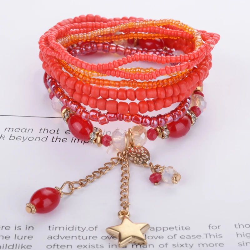 Женский браслет с кисточками в богемном стиле подвеской из бусин и кристаллов |