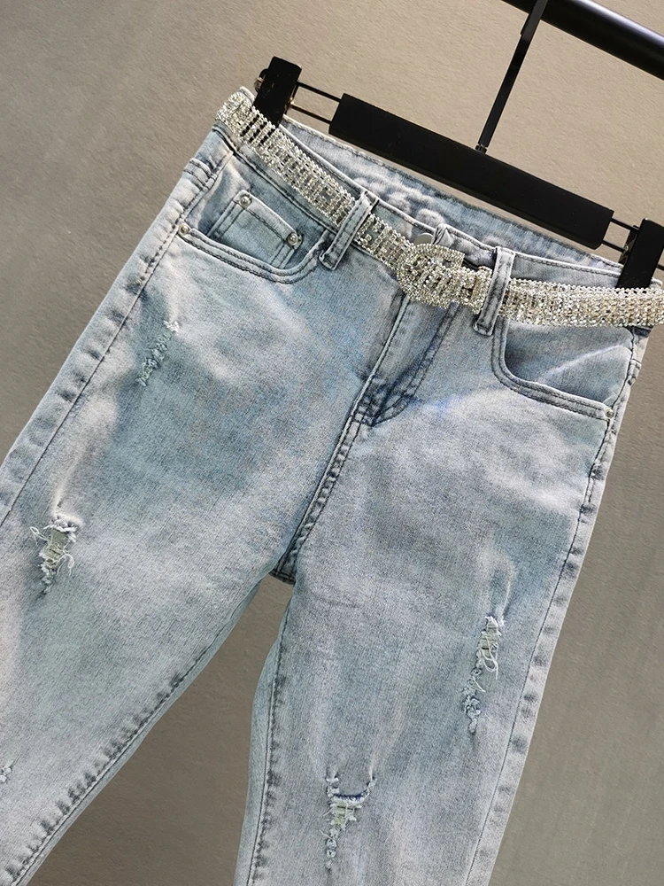 Джинсы женские облегающие синие тонкие эластичные с кисточками обтягивающие