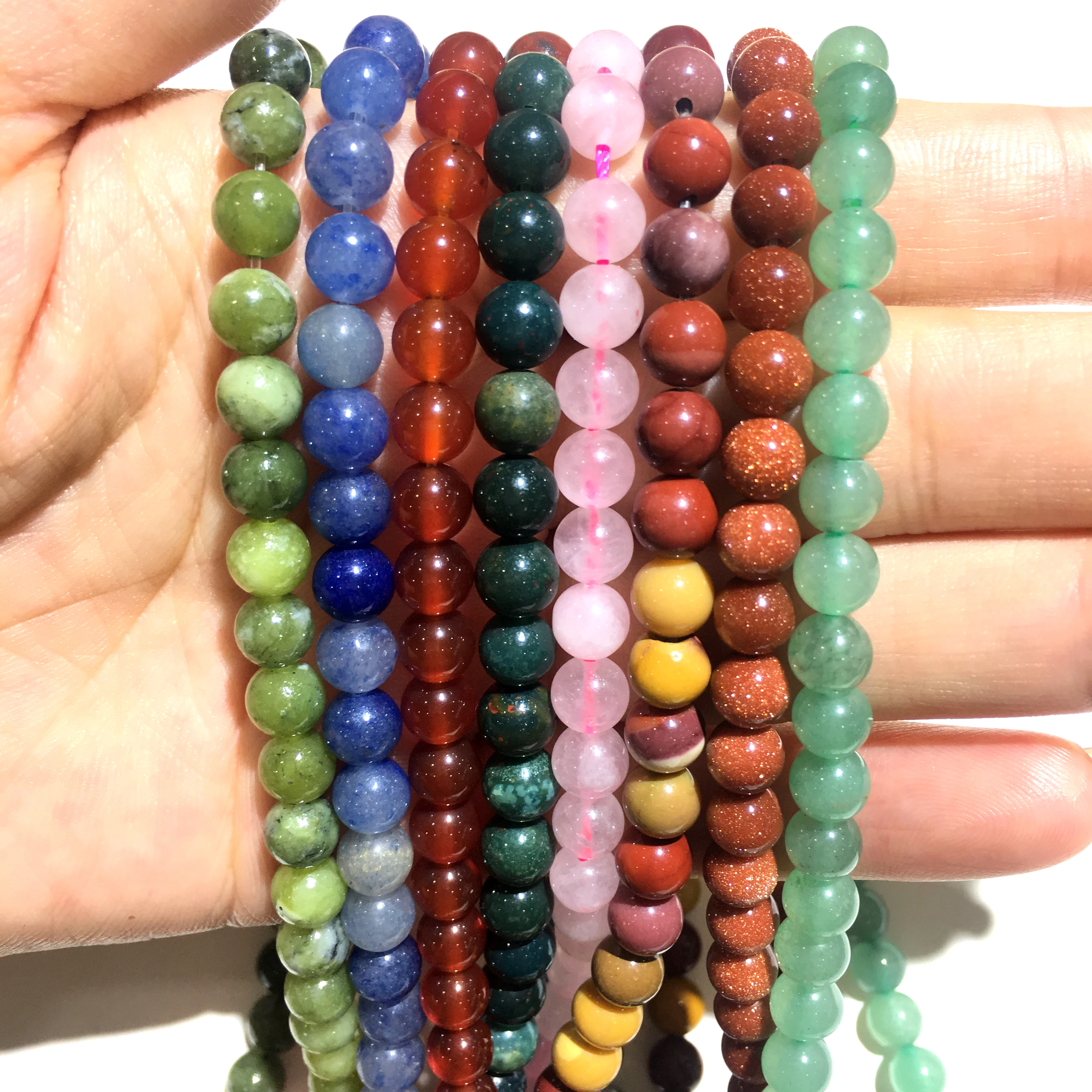 Круглые бусины из натурального камня россыпью для изготовления ювелирных