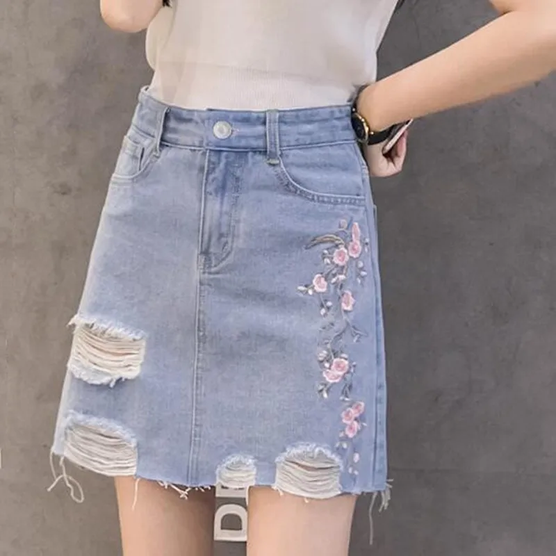 

2020 New Embroidered Flowers Raw Edge Denim Skirt Women Skirts Summer Skirt Washed Holes Jeans Skirt Elegant Temperament Skirts