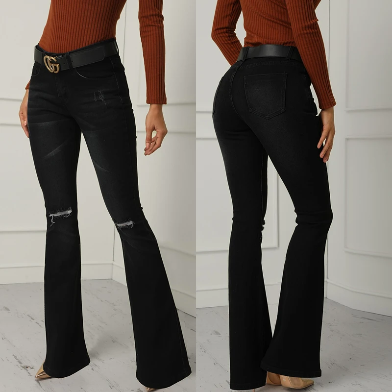 Женские Стрейчевые расклешенные джинсы с высокой талией обтягивающие Рваные