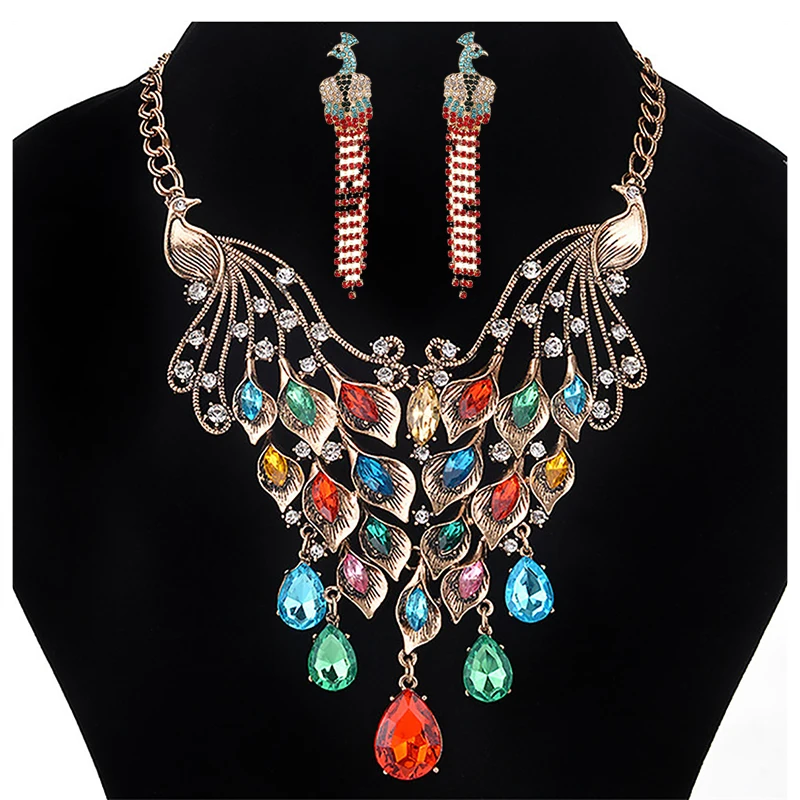 

Комплект из колье и серёг, с подвеской в виде птицы