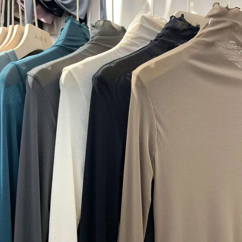 

Hstar 2021 New Women Turtleneck Mesh Perspective Blouse Spring Thin See Through Solid Color Slim Bottoming Lace Long Sleeve Tops
