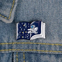 astronaut enamel pin starry sky book custom brooches for bag clothes lapel pin universe badge space jewelry gift kids friends