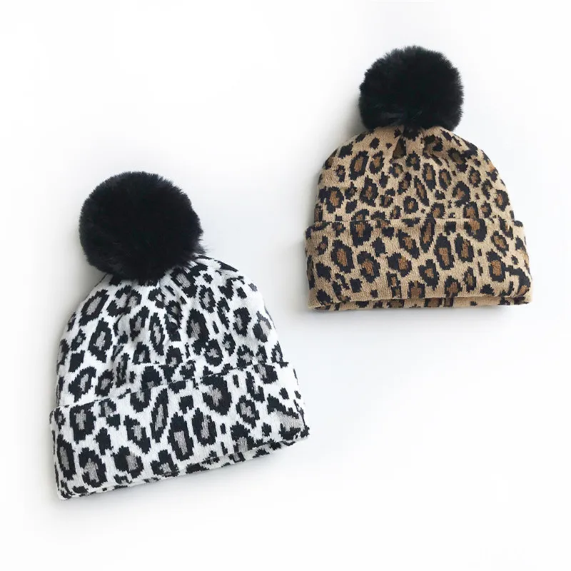 

Women Leopard Printed Hats Winter Knitted Fur Caps Warm Photography Props Girls Hats Knitted Hat Cute Fur Pom Poms Warm Ski Cap