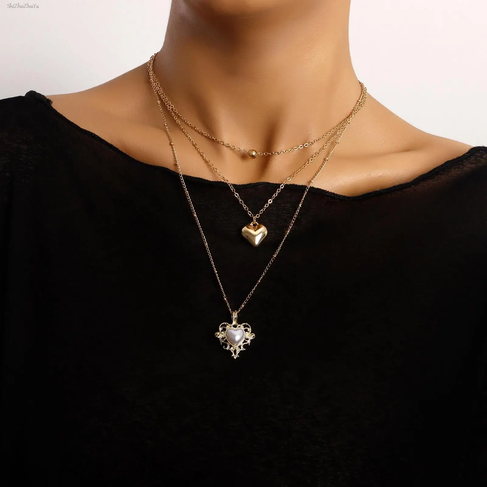 

Trendy Multilayer Pearl Necklace, Exquisite Handmade Beaded Metal Heart-shaped Hollow Pendant, Beaded Chain, Ladies Accessories