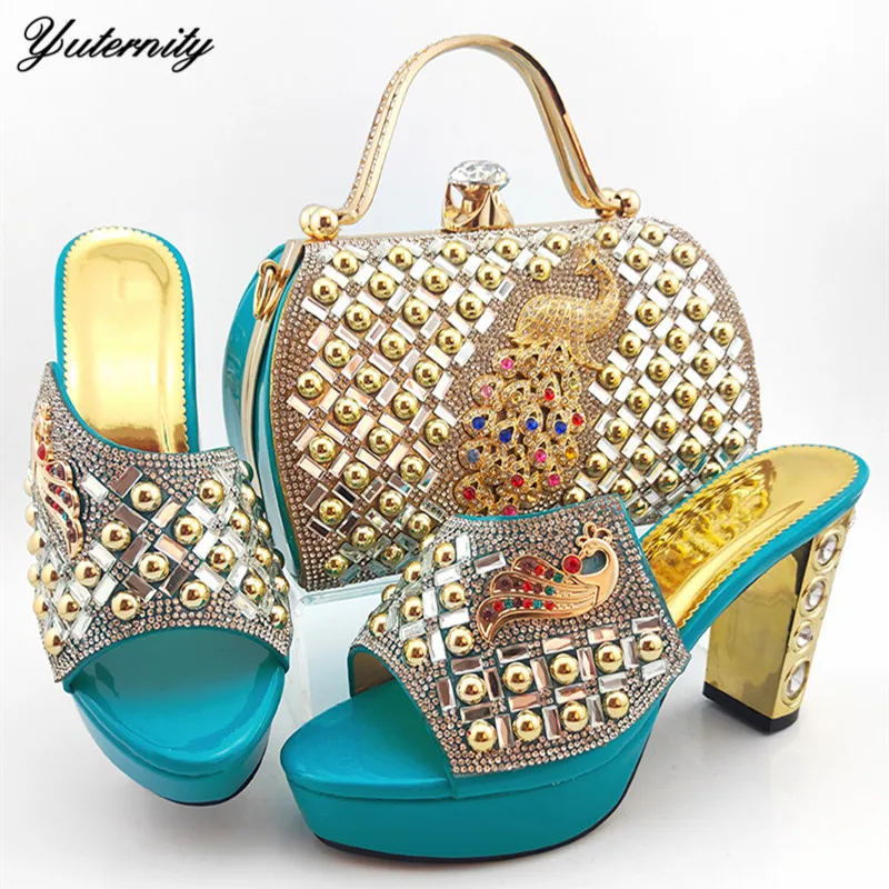 Комплект из туфель и сумочки в африканском стиле со стразами форме павлина