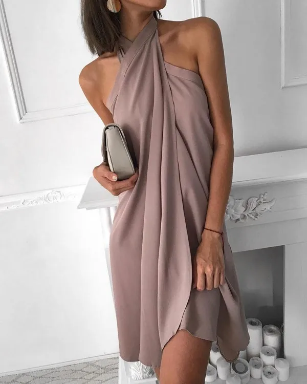 

2021 summer new sexy women's dress, halter neck loose and irregular casual beach dress
